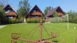STOKROTKA nad Soliną - domki całoroczne z kominkami i wypożyczalnia rowerów LOGO - STOKROTKA nad Soliną - domki całoroczne z kominkami i wypożyczalnia rowerów